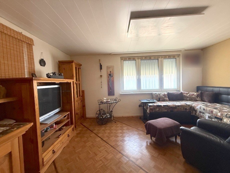 Wohnzimmer EG Bild 1 Reiheneckhaus Selters